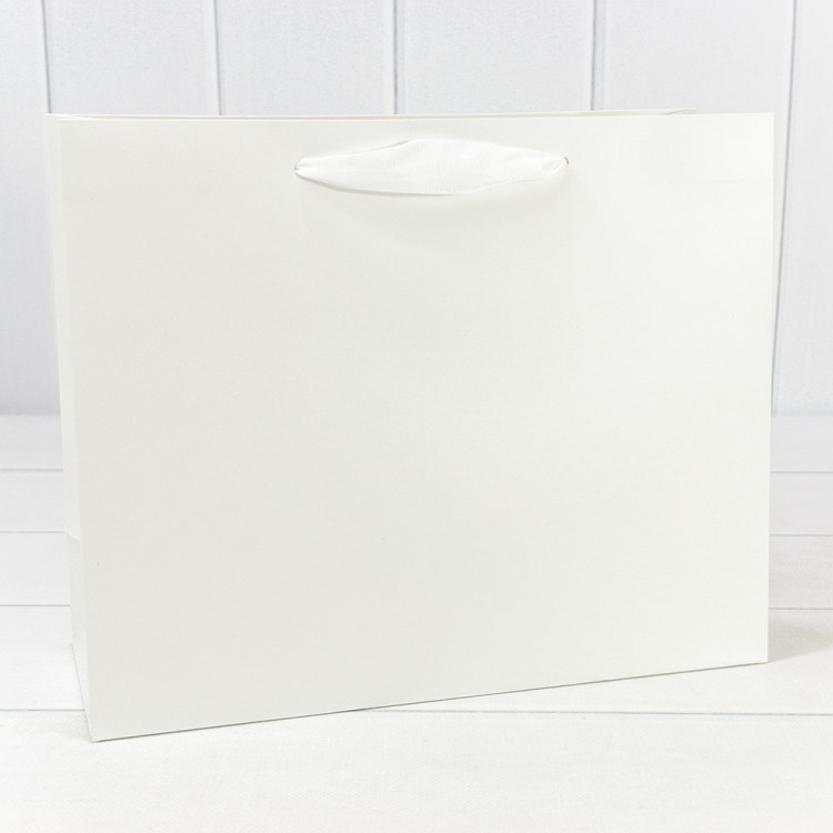 000200CA Пакет подарочный Белый 32*26*13 230г 1/20 1/120 000200CA Пакет подарочный Белый 32*26*13 230г 1/20 1/120